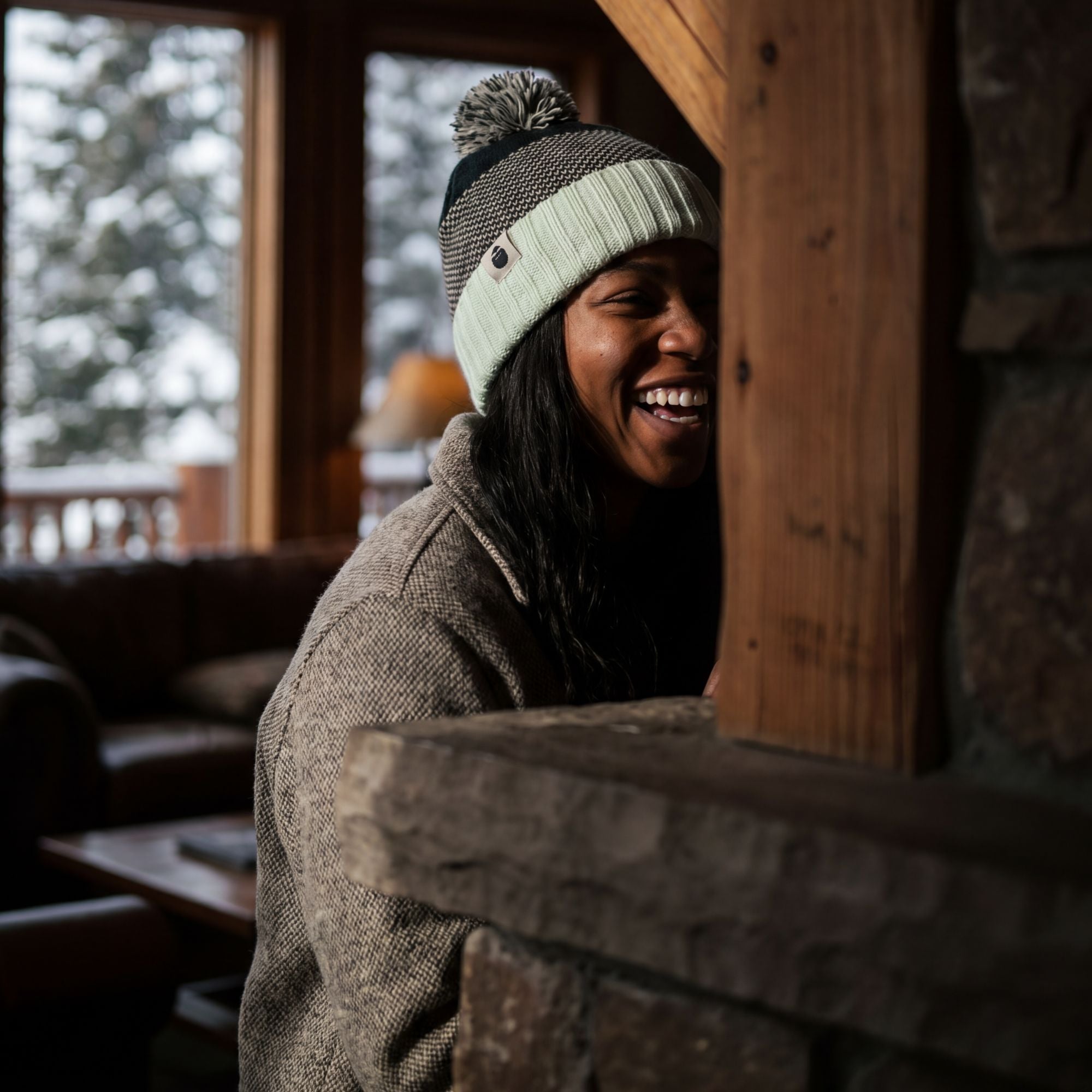 Woman wearing Bigfoot Kick Ski Resort Beanie