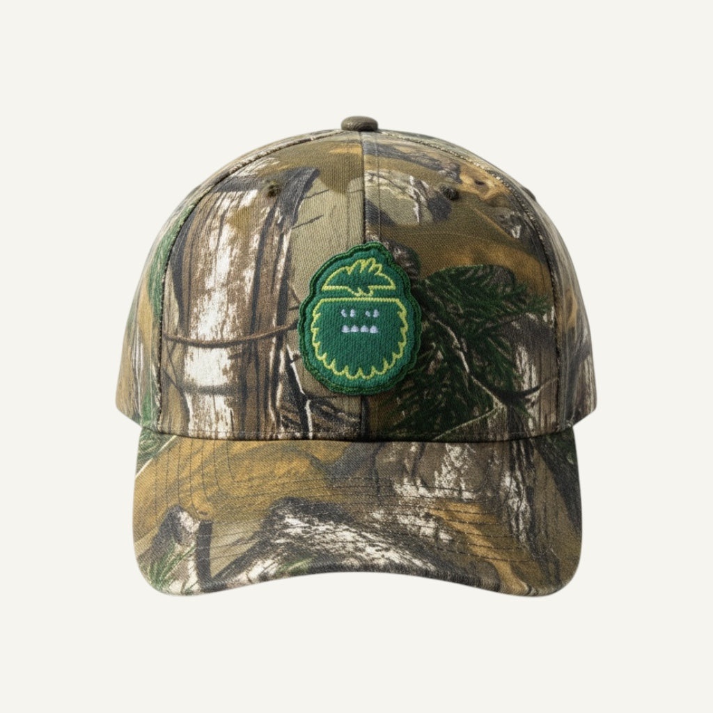 Bigfoot Kick Forest Camo hat with Bigfoot felt patch