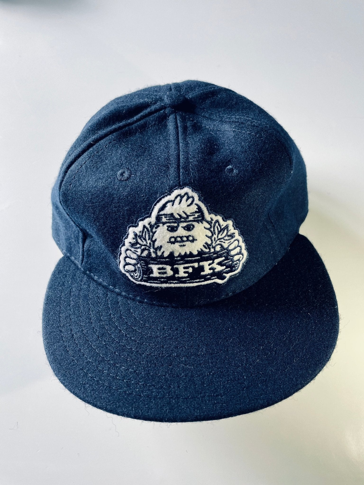 Camp Bigfoot Cap in Navy - Bigfoot Kick