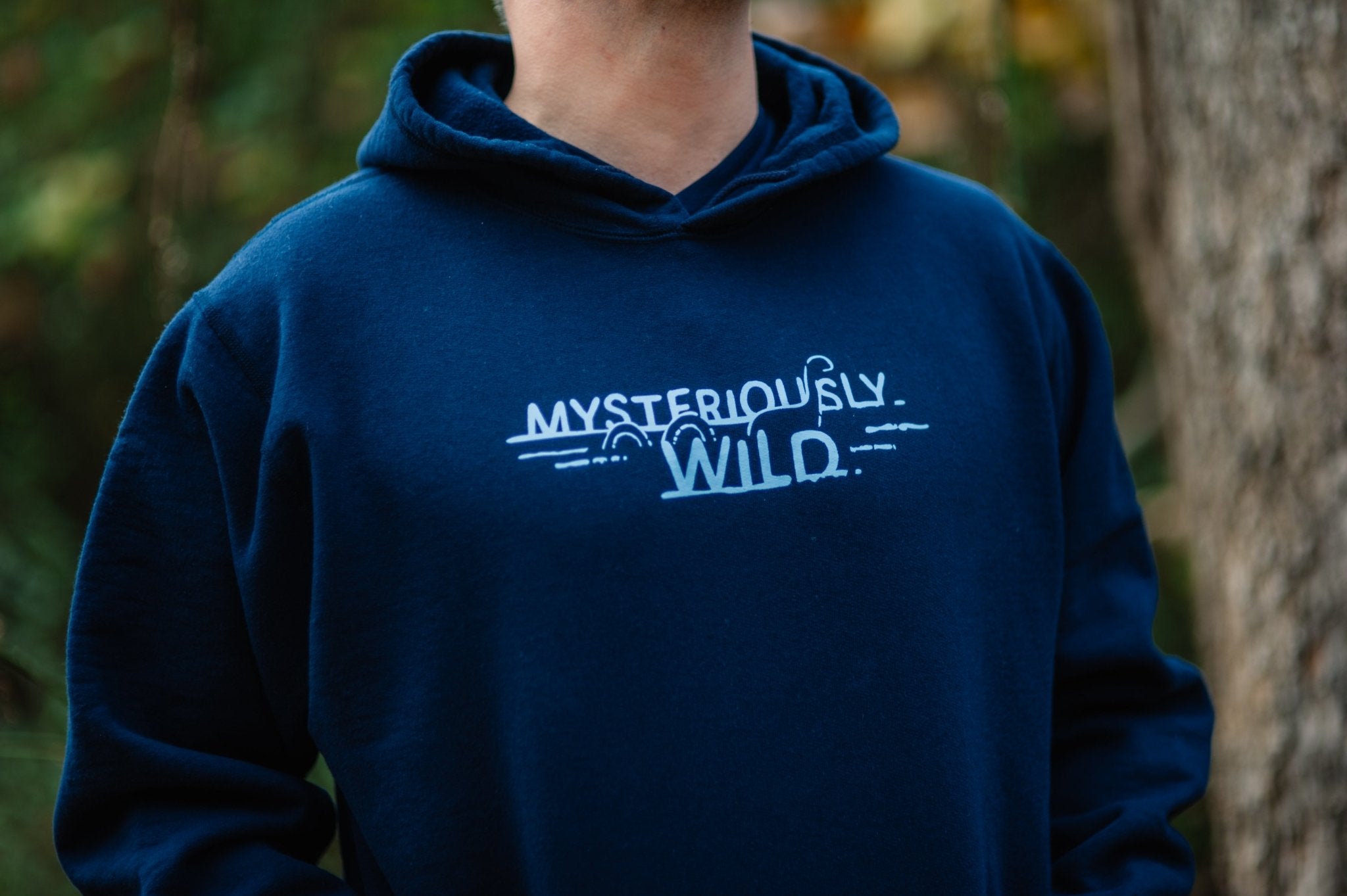 Mysteriously Wild Hoodie in Navy - Bigfoot Kick